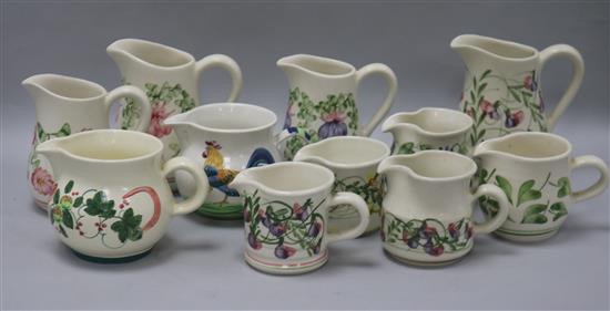 A collection of eleven Rye pottery jugs